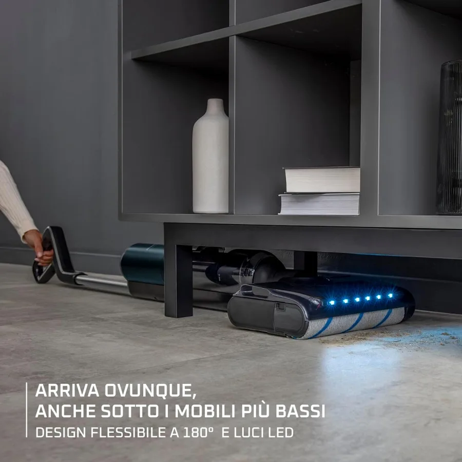 Rowenta X-Clean 7 sotto un mobile basso con le luci LED accese